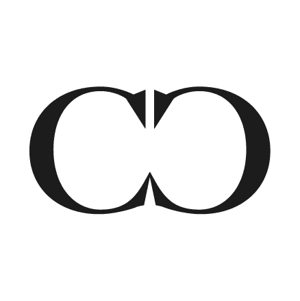 Standalone 'CD' monogram — interlocked serif letterforms with high-contrast thick-thin strokes