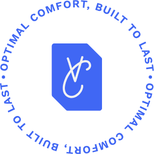 Brand seal — geometric 'VC' monogram encircled by 'OPTIMAL COMFORT, BUILT TO LAST' tagline